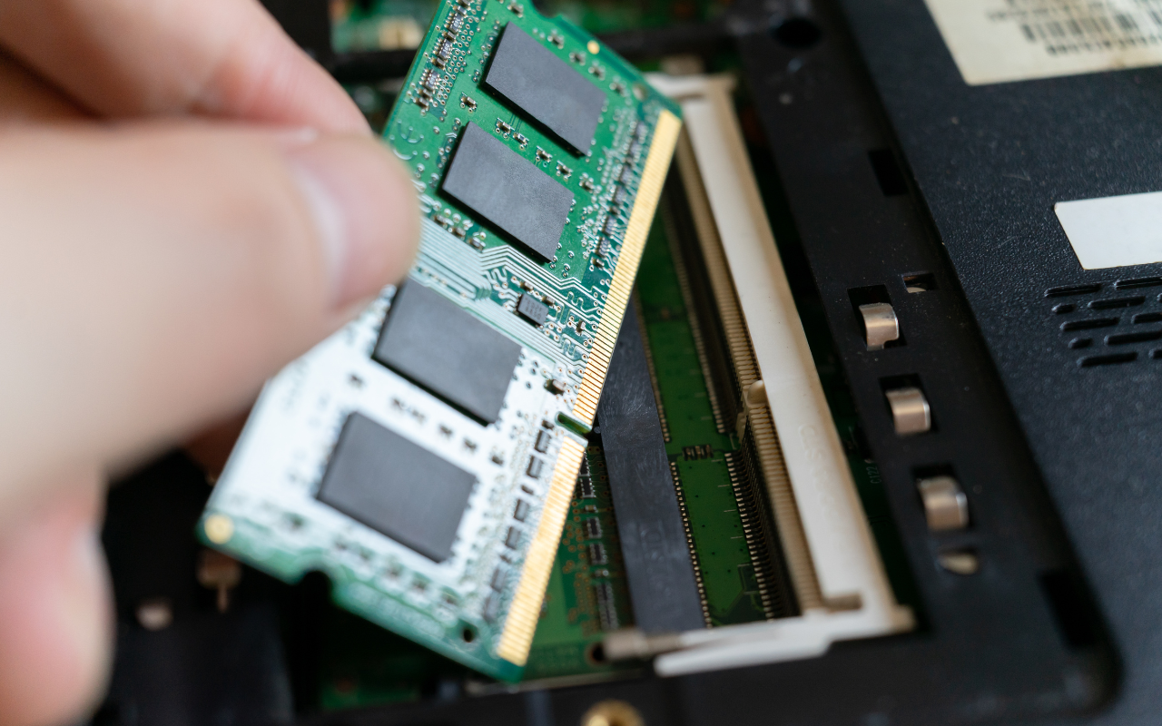 Two 32GB RAM modules installed on a computer motherboard